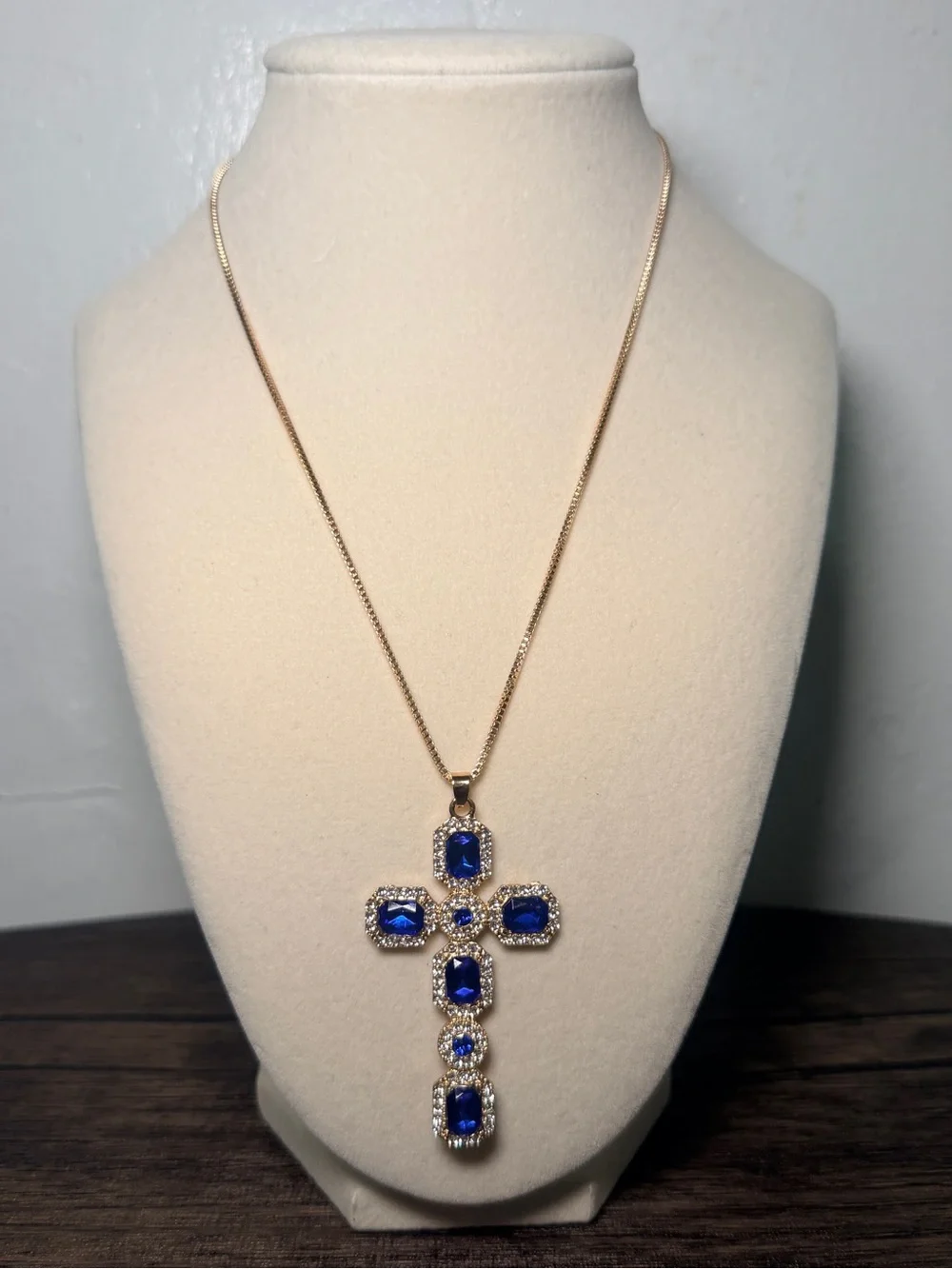Gold-Tone Cross Pendant Necklace with Deep Blue Stones